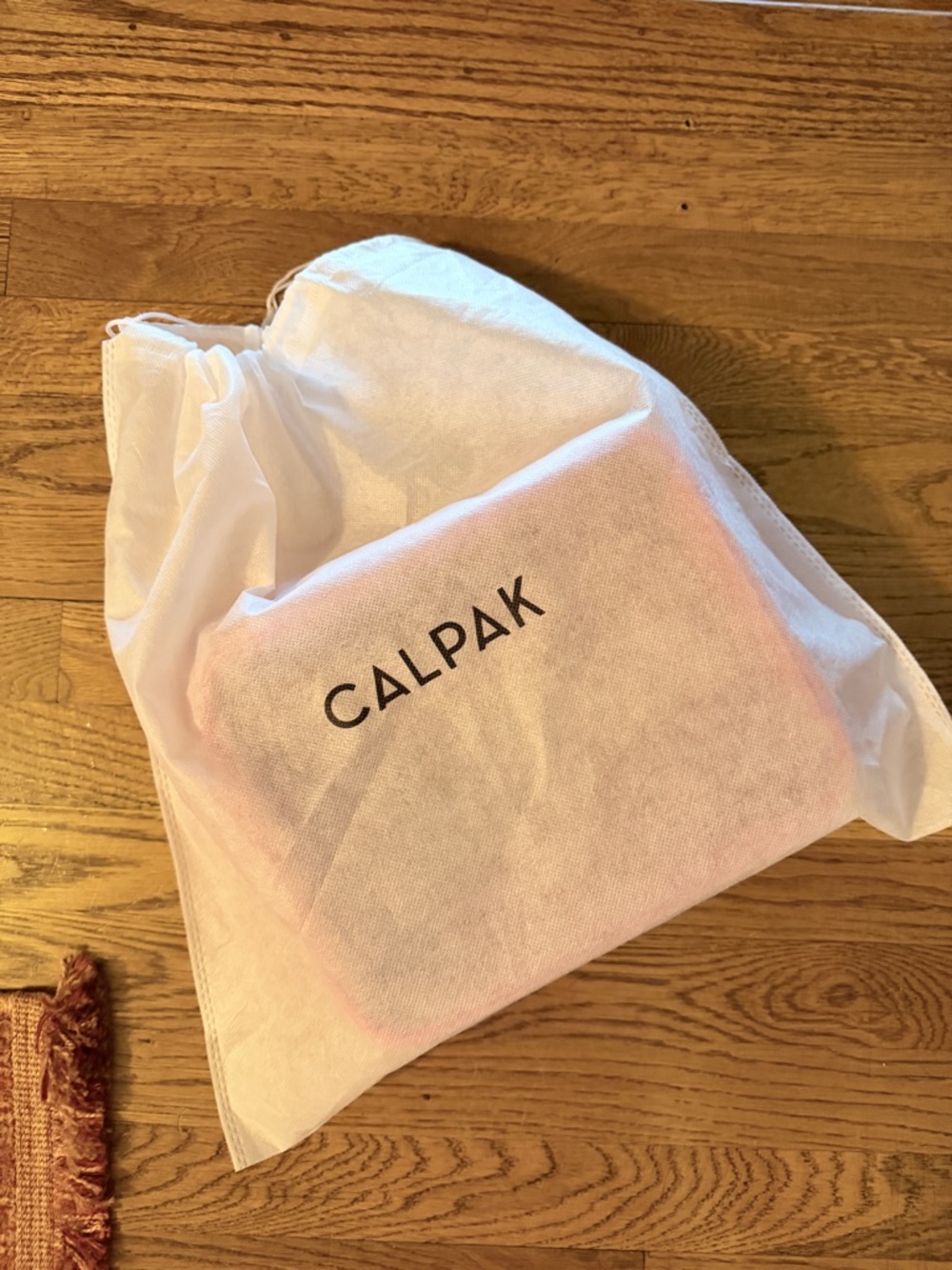 Calpak Clear Travel Cosmetic Case with Pink Trim - Picture 8 of 8